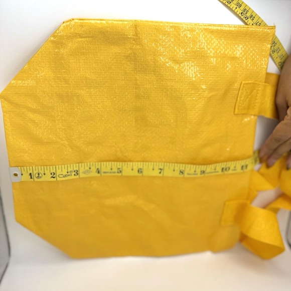 NYCC 2025 Walmart Exclusive Yellow Tote Bag w/ Blue Spark Charm Giveaway - Picture 6 of 8